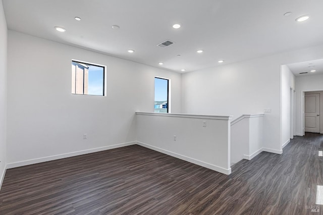 9017 Camino Colegio Rd, Rohnert Park, CA 94928 - spare room featuring dark wood-type flooring, plenty of natural light, baseboards, and recessed lighting