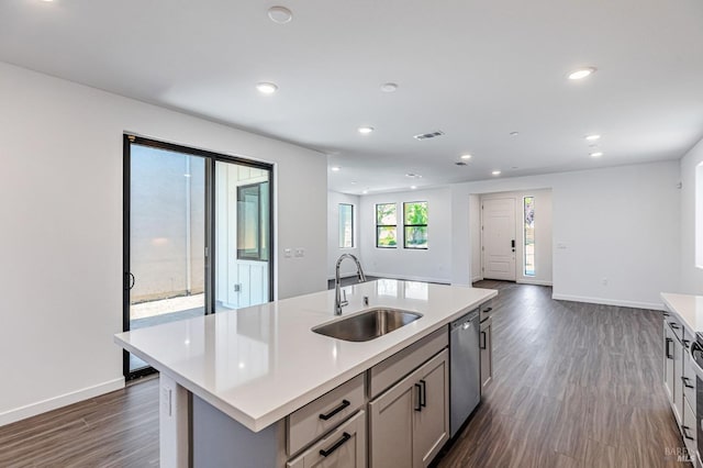9017 Camino Colegio Rd, Rohnert Park, CA 94928 - kitchen featuring a sink, stainless steel dishwasher, light countertops, dark wood-style floors, and recessed lighting