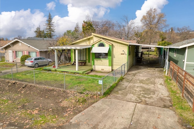 view of front of home with a carport