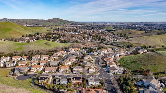 drone / aerial view featuring a mountain view