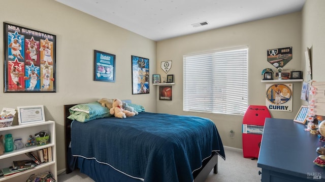 bedroom with light carpet