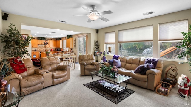 living room featuring ceiling fan