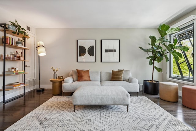 living room featuring dark hardwood / wood-style floors