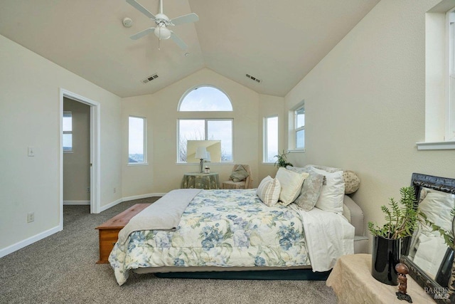 carpeted bedroom with ceiling fan and lofted ceiling