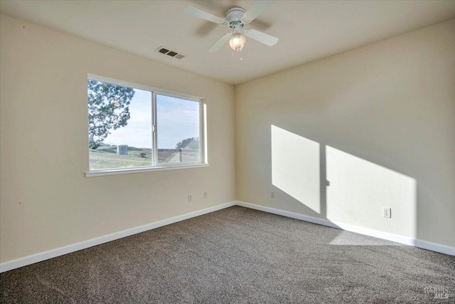 carpeted empty room with ceiling fan