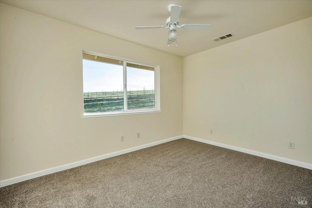 unfurnished room featuring carpet floors and ceiling fan