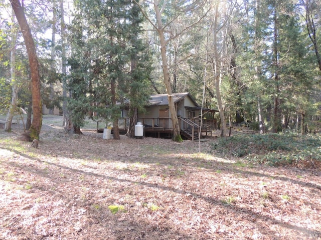 view of yard with a wooden deck