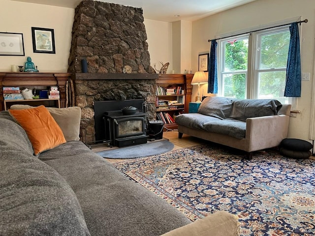 living room with a wood stove