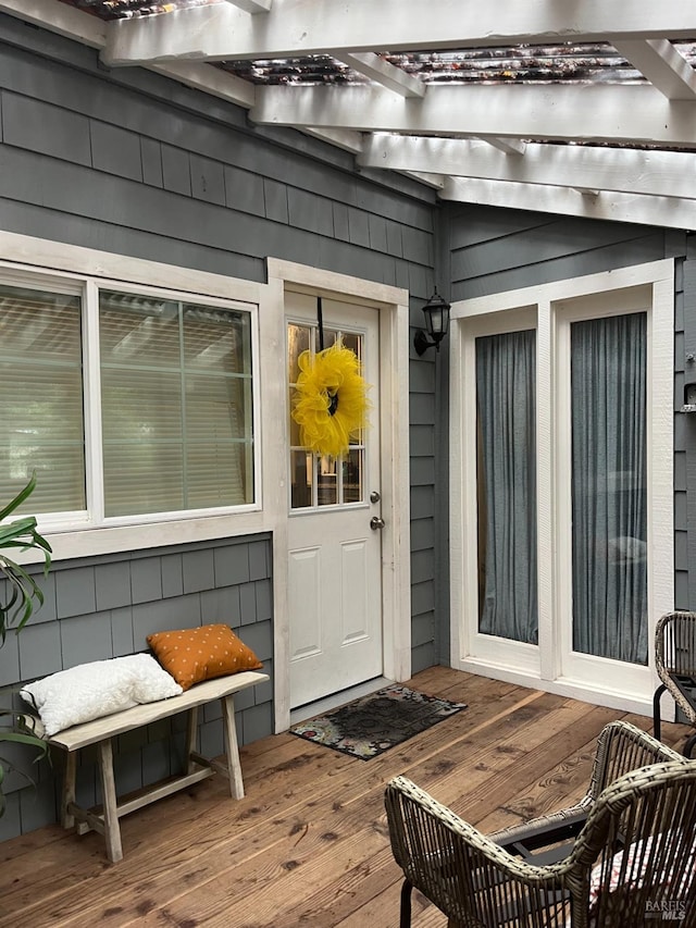 doorway to property with a wooden deck