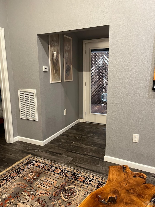 interior space featuring dark hardwood / wood-style floors