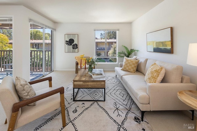 living room featuring light colored carpet