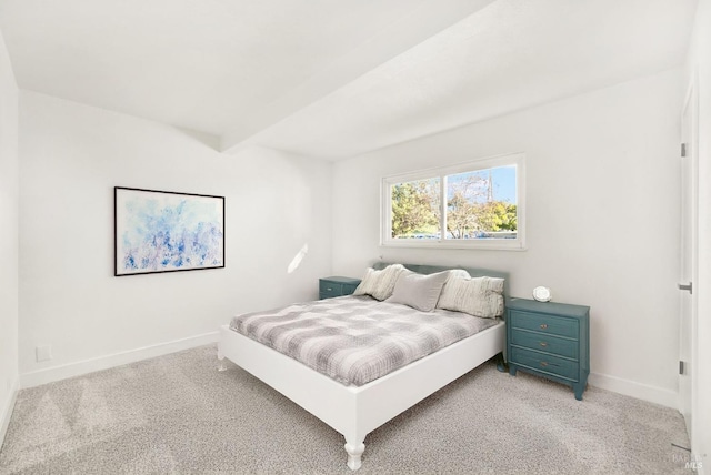 bedroom with light carpet