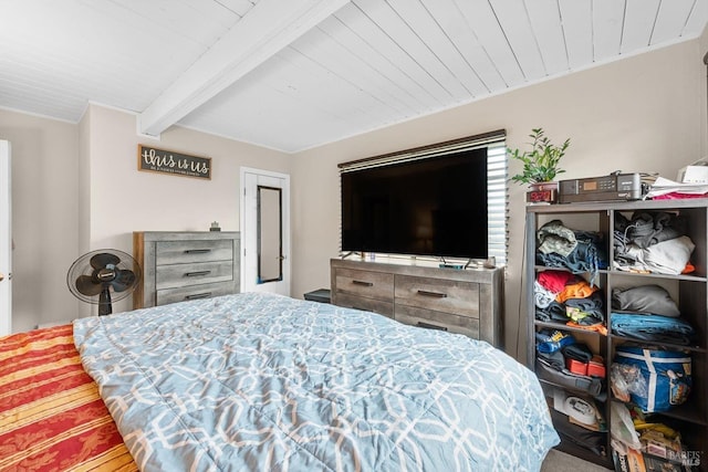 bedroom featuring wood ceiling and beamed ceiling