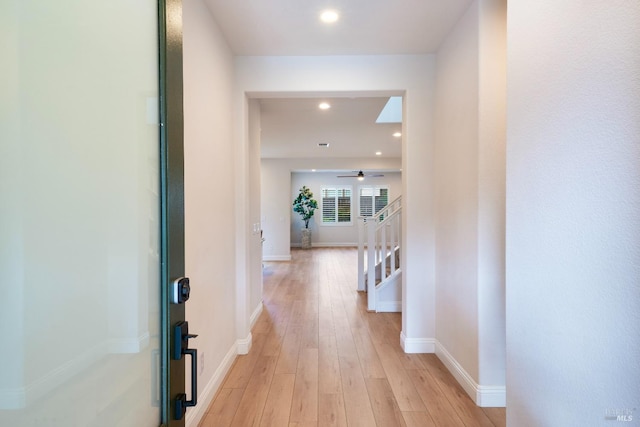 hallway featuring light hardwood / wood-style flooring