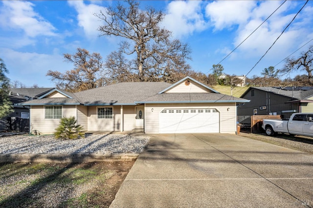 single story home featuring a garage