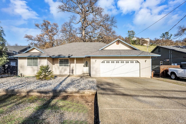 single story home with a garage