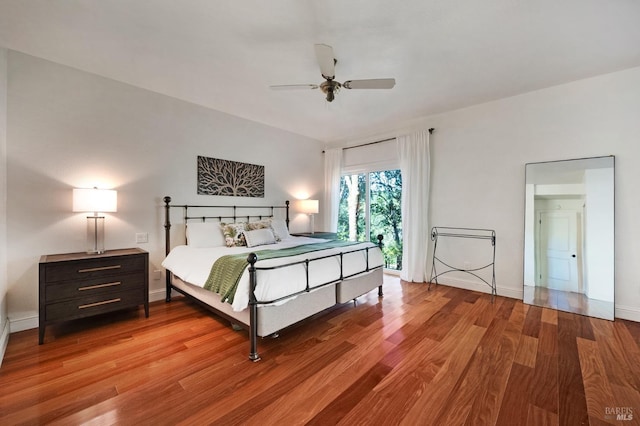 bedroom with ceiling fan and light hardwood / wood-style flooring