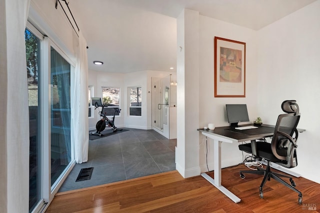 office area with dark hardwood / wood-style floors