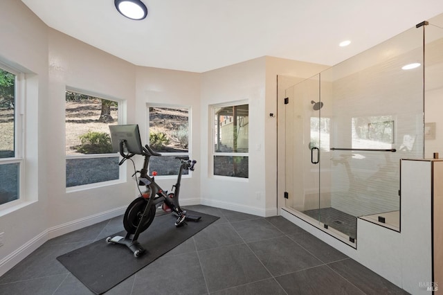 workout room with dark tile patterned flooring