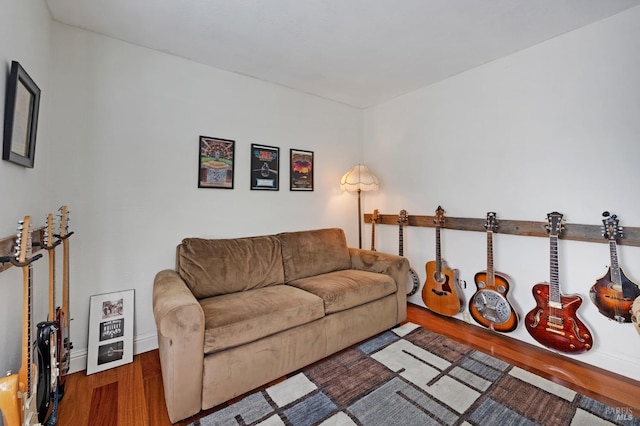 living room featuring dark wood-type flooring