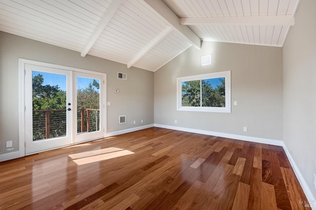 unfurnished living room featuring beam ceiling, high vaulted ceiling, french doors, and hardwood / wood-style floors