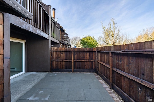 view of patio featuring a baseboard radiator