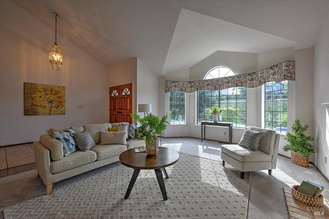 living room with carpet flooring and vaulted ceiling