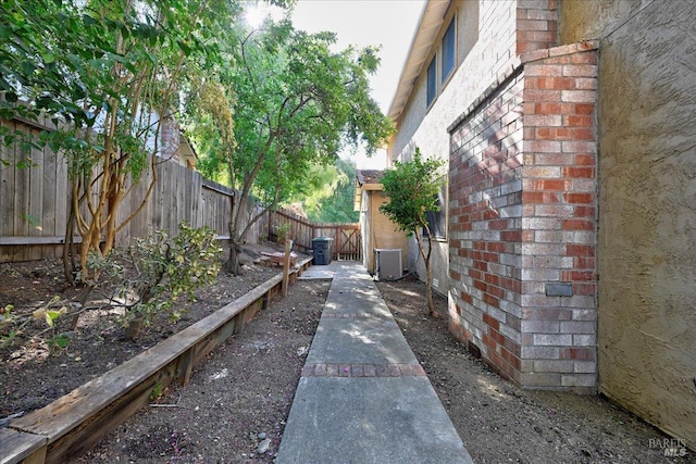 view of home's exterior with central AC unit