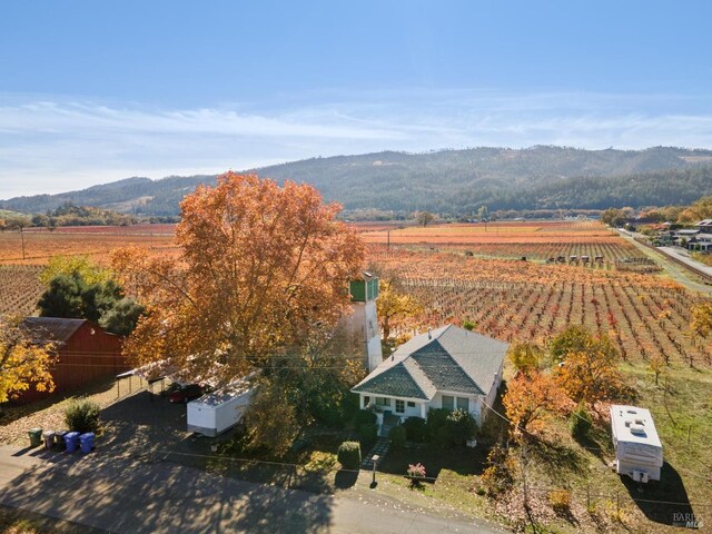 aerial view featuring a mountain view and a rural view