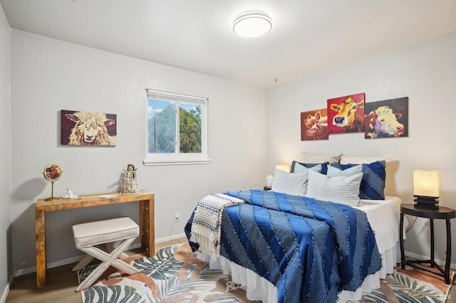 bedroom featuring hardwood / wood-style floors