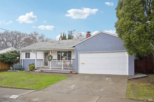 ranch-style home featuring a front lawn, a porch, and a garage