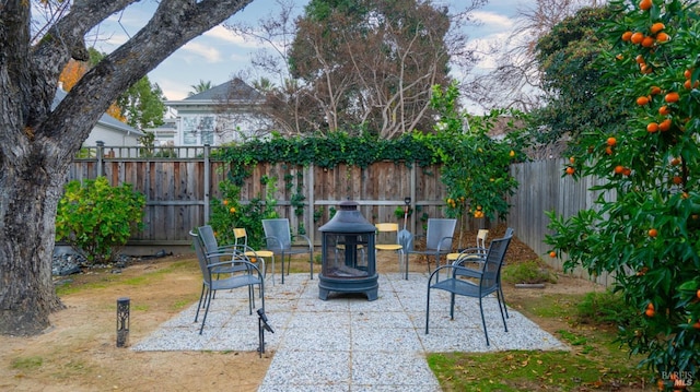 view of patio featuring a fire pit