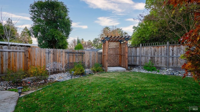 view of yard with a fenced backyard