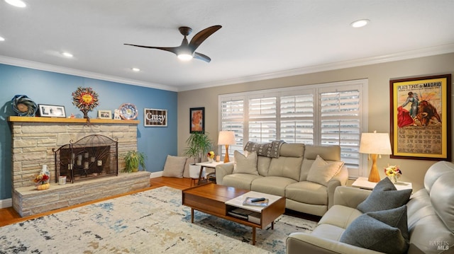 living area featuring crown molding and wood finished floors