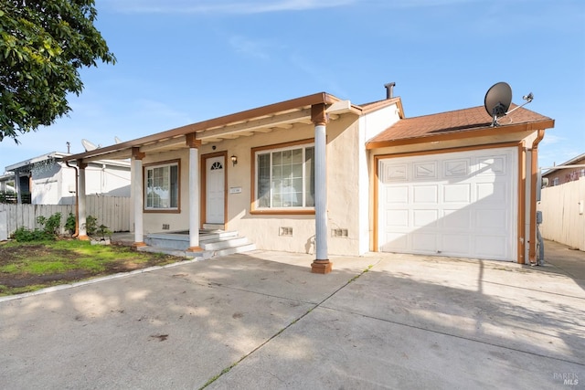 ranch-style house featuring a garage