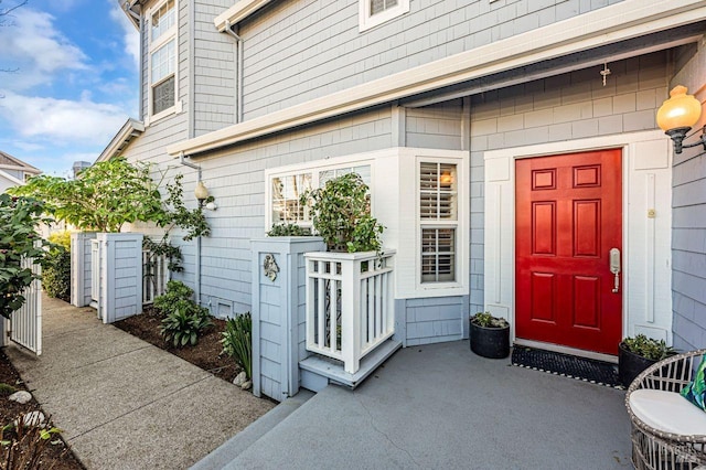 entrance to property with a patio