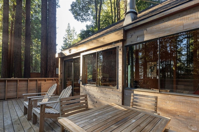 deck featuring a sunroom