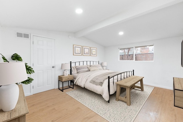 bedroom featuring vaulted ceiling with beams, recessed lighting, visible vents, baseboards, and light wood-type flooring