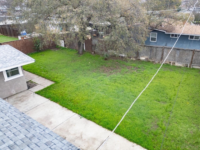 view of yard featuring a fenced backyard