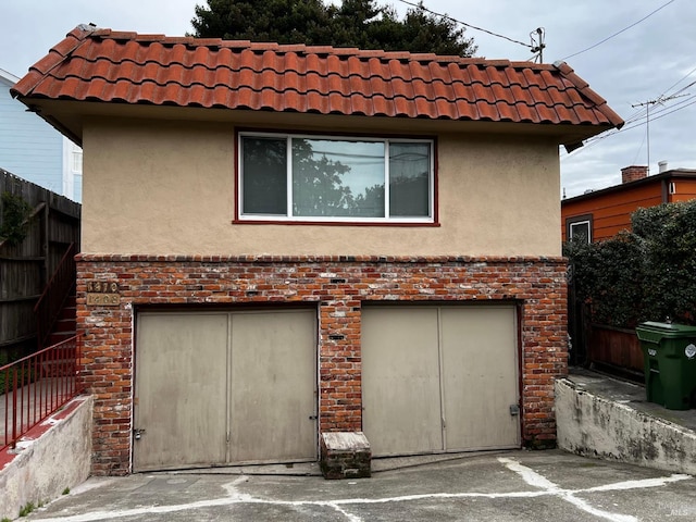 exterior space with a garage