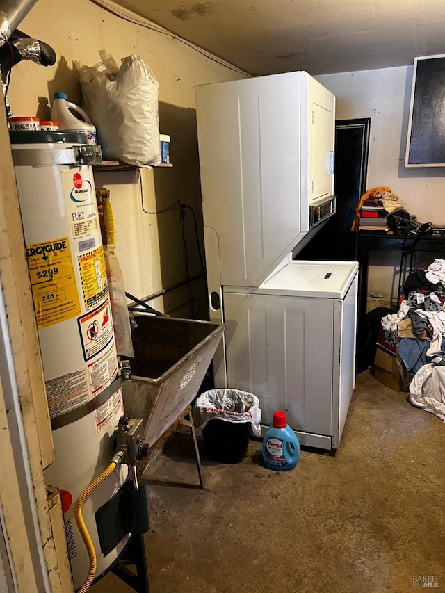 laundry room featuring sink, stacked washer / drying machine, and gas water heater