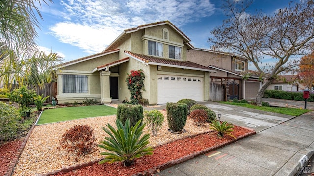 view of front of home featuring a front yard and a garage