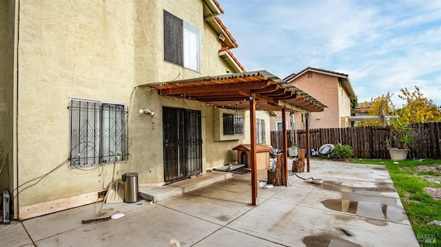 view of patio featuring a pergola