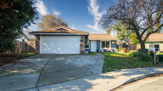 ranch-style home with a garage