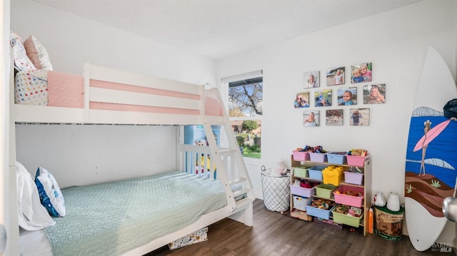 bedroom featuring hardwood / wood-style flooring