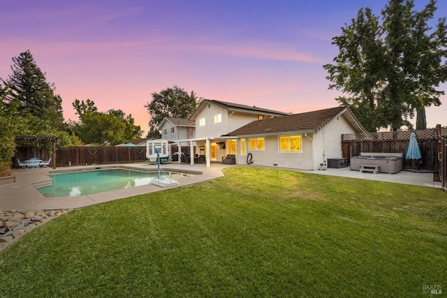 pool at dusk with a shed, a hot tub, a patio, and central air condition unit