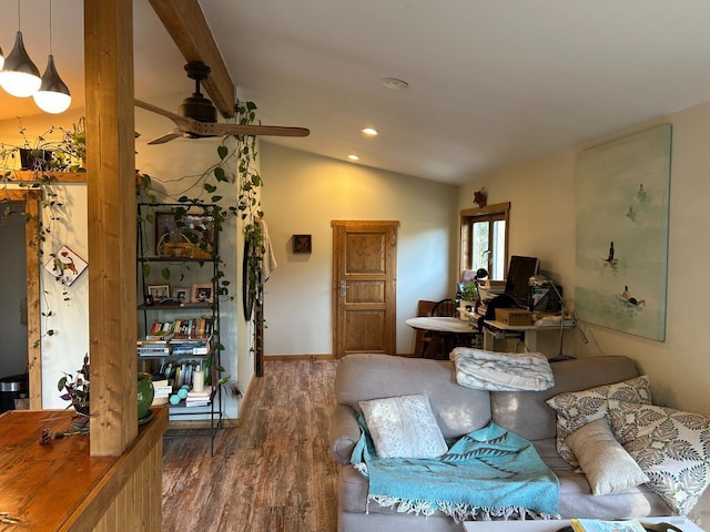 living room with lofted ceiling and hardwood / wood-style flooring