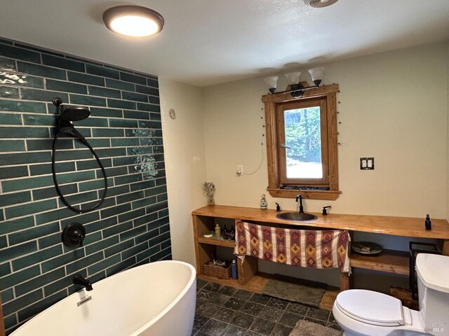 34620 Eureka Hill Rd, Point Arena, CA 95468 - bathroom featuring a soaking tub, toilet, vanity, and a shower