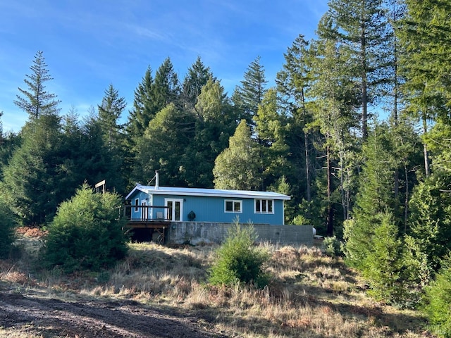 view of front of property featuring a deck