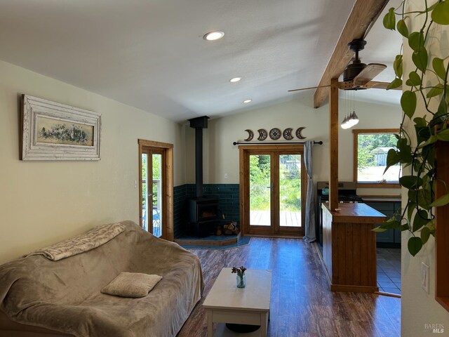 34620 Eureka Hill Rd, Point Arena, CA 95468 - living area with a wood stove, ceiling fan, vaulted ceiling, dark wood-type flooring, and recessed lighting